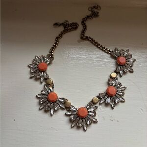 Elegant Floral Necklace with Orange Accents